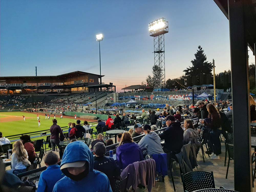 Cheney Stadium Powerful sports lighting illuminates a baseball park at dusk