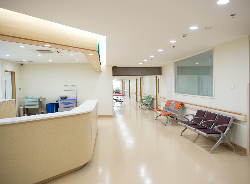 Healthcare Lighting Recessed downlights installed in the ceiling of a hospital lobby