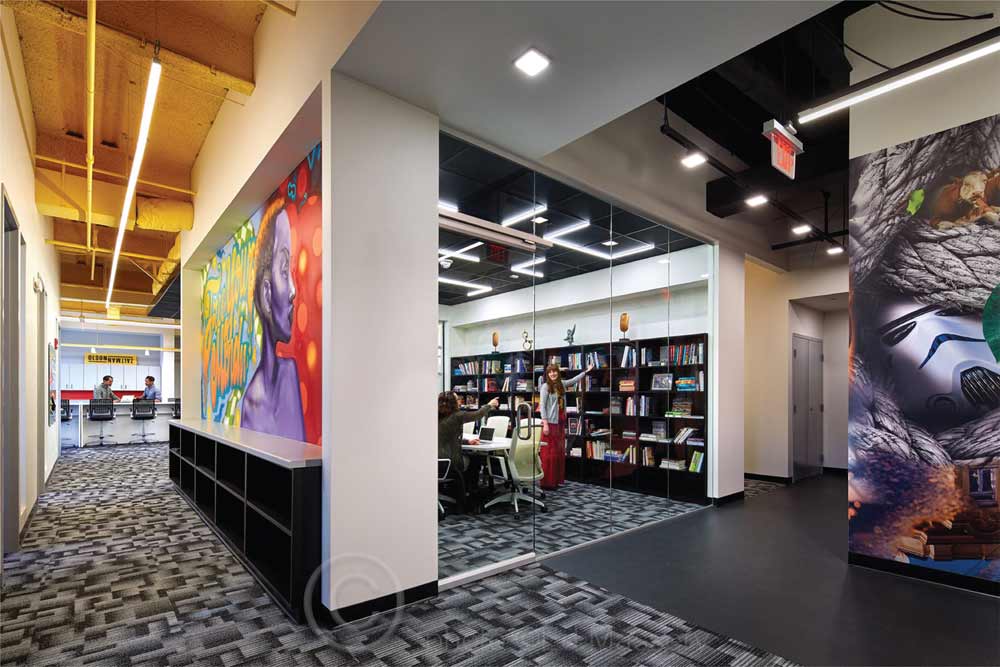 PPG Place Linear and geometric ceiling and pendant mount lighting add modern flair to an office space